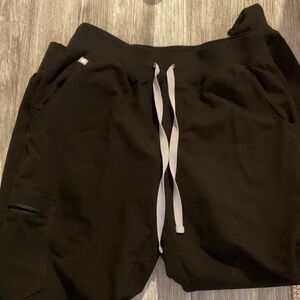 Figs Black Scrub joggers with White Care Label